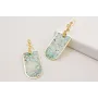 Pendientes con 5 flores y semi ovalo estampado tur