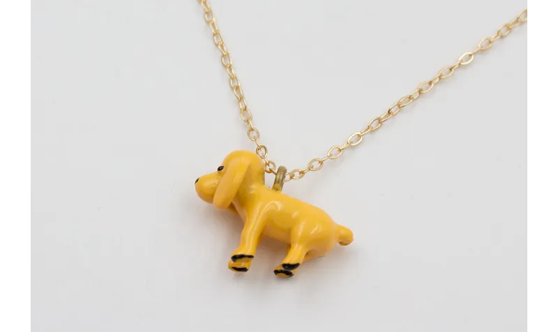 Solitario cadena eslabón pequeño dorado con perro
