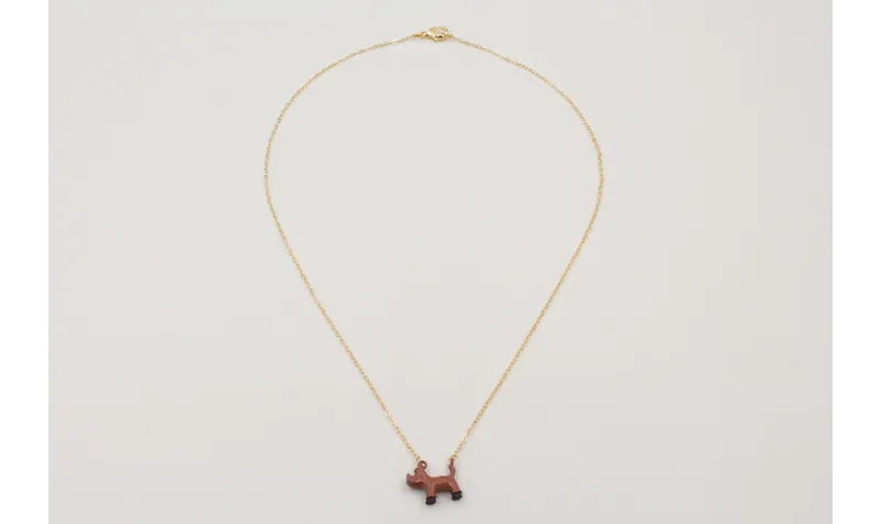Solitario cadena eslabón pequeño dorado con perro