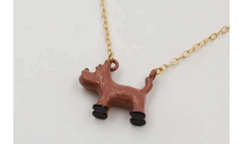 Solitario cadena eslabón pequeño dorado con perro
