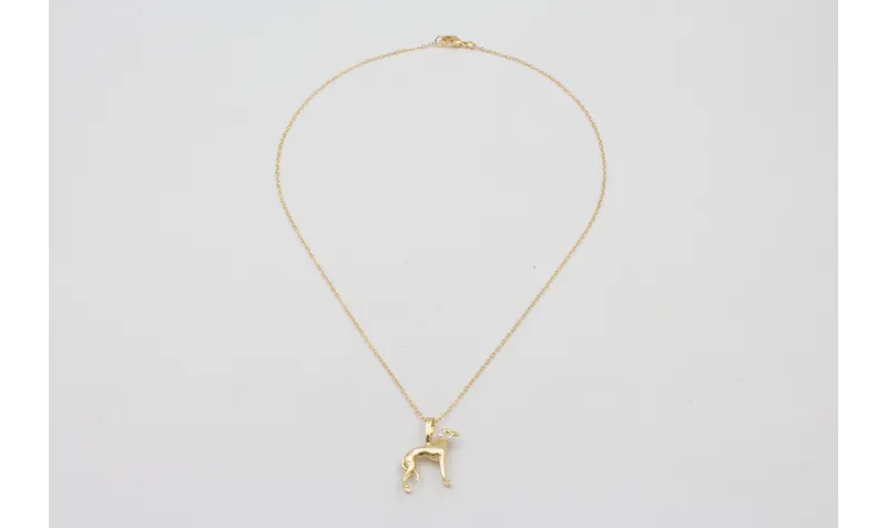 Solitario cadena eslabón pequeño dorado con perro