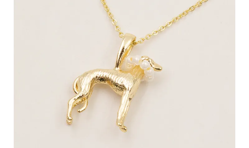 Solitario cadena eslabón pequeño dorado con perro
