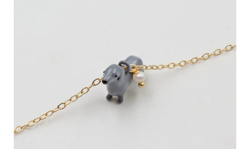 Pulsera cadena eslabón pequeño dorado con perro SA