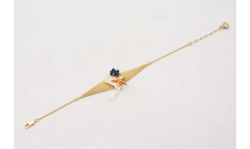 Pulsera malla rombo con manta raya beige,estrella