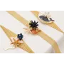 Pulsera malla rombo con manta raya beige,estrella