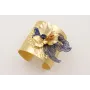 Brazalete rigido flor de loto,pez tropical azul os