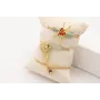 Pulsera hilo metalico dorado palido con nudo macra