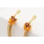 Pendientes serpiente ojos verdes con flecos dorado