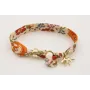 Pulsera lazo estampado bies flores lilas y moradas