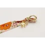 Pulsera lazo estampado bies flores lilas y moradas