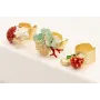 Anillo con burruño micro tubos coral,caracola dora