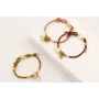 Pulsera cordón pistacho con hilo dorado, tubo meta