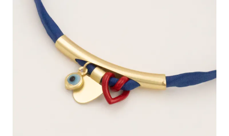 Pulsera seda natural azul marino con tubo curvado 