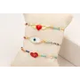 Pulsera hilo metalico dorado con colgante 2 anilla