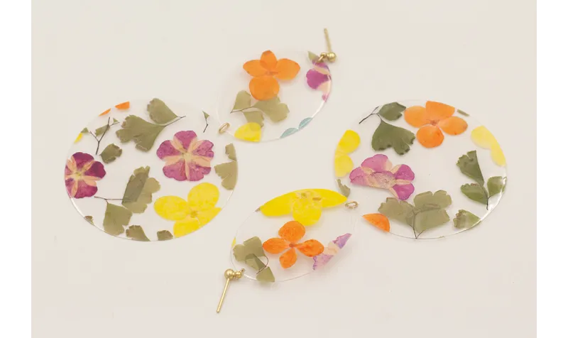 Pendientes lentejuela disco y ovalo con flores nat