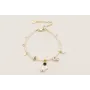 Pulsera astronauta estrelle dorada en el pecho con