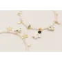 Pulsera astronauta estrelle dorada en el pecho con