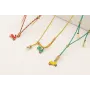 Collar cordón hilo dorado color turquesa,nudos mac