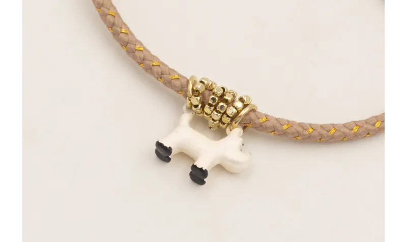Pulsera cordón hilo dorado color beige con colgant