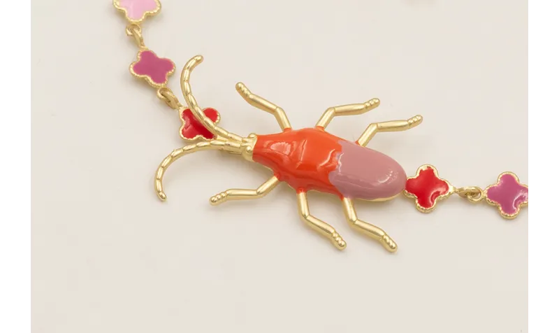 Pulsera cadena mini treboles esmaltados lila,rojo,