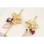 Pendientes perno daga con  flor dorada mate,burruñ