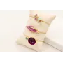 Pulsera hilo dorado con nudo serpiente y centro fl