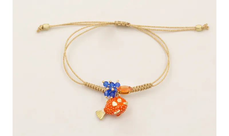 Pulsera hilo metalico dorada palido con burruño fa
