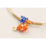 Pulsera hilo metalico dorada palido con burruño fa