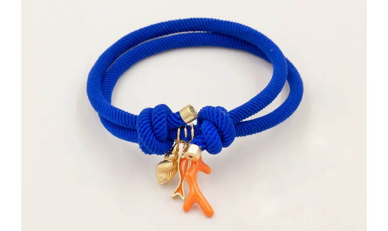 Pulsera cordón elastico azulón con nudos corredizo