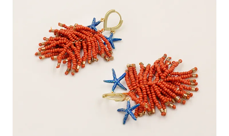 Pendientes floco abalorio naranja, estrellas esmal