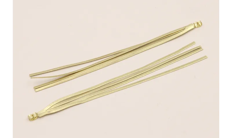 Fleco tuerca de 4 Tiras de 2mm. 125mm Oro Mate
