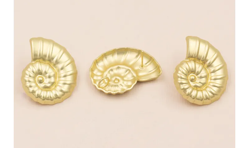 Pendiente caracola 30*24mm Oro Mate