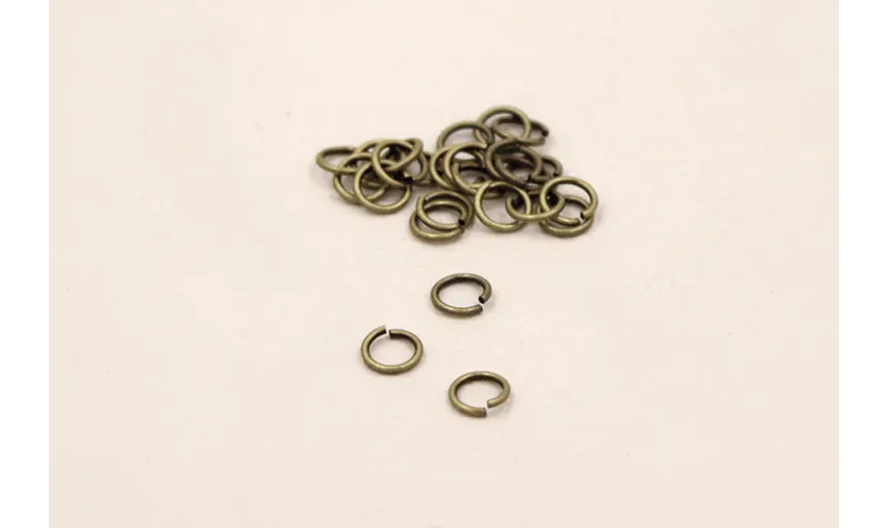 ARANDELA RED. 4mm diámetro * 0,8. ORO VIEJO / Arandelas de Latón / Zamak